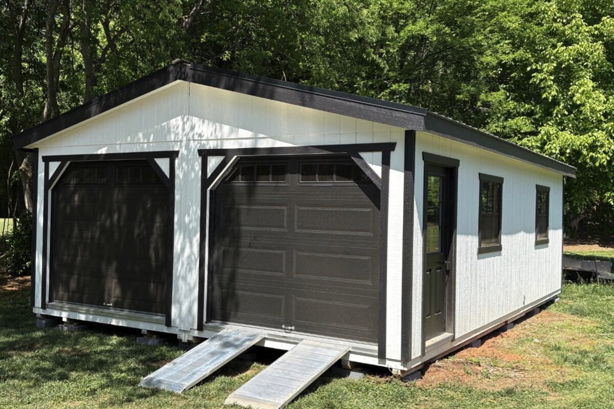 Pine View double-wide portable garage with overhead door