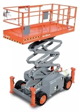 Rough-terrain scissor lift used during tall metal structure installation